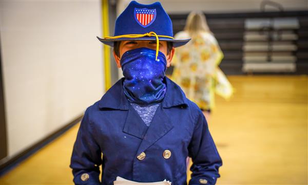A boy dressed as a soldier